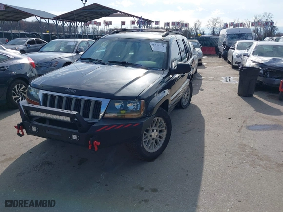 2004 Jeep Grand Cherokee Limited with VIN 1J4GW58N74C120435, listed as a IAAI auction lot 41815094 with 193,056 mi miles. Bid and sale history available at carsss.com. Image 18.