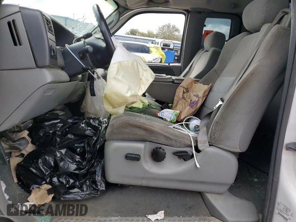 2004 Ford F-250 XL with VIN 1FTNX20PX4EA22882, listed as a Copart auction lot 79014334 with 262,447 mi miles and Salvage title. Bid and sale history available at DreamBid. Image 7.