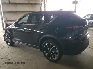 2023 Mazda CX-5 2.5 S Premium Plus Package with VIN JM3KFBEM2P0217307, listed as a Copart auction lot 44818595 with 64,219 mi miles and Salvage Title. Bid and sale history available at carsss.com. Image 2.