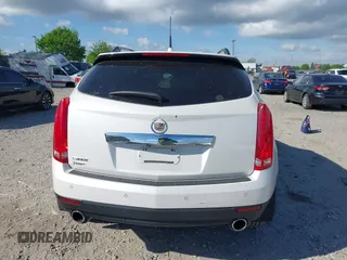 2011 Cadillac SRX Performance Collection z VIN 3GYFNBEYXBS543819, wystawiony jako IAAI lot #42159051 z przebiegiem Nie podano mil oraz . Historia ofert i sprzedaży dostępna na DreamBid. Obrazek 17.