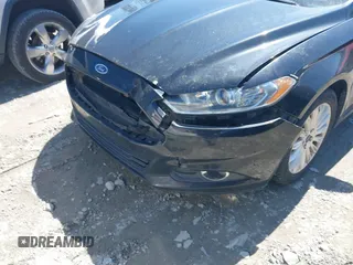 2015 Ford Fusion SE Hybrid with VIN 3FA6P0LU8FR148917, listed as a IAAI auction lot 41876627 with 253,952 mi miles. Bid and sale history available at carsss.com. Image 6.