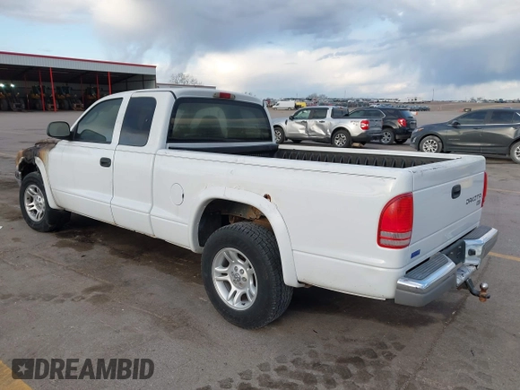 2003 Dodge Dakota SLT z VIN 1D7HL42X33S181413, wystawiony jako IAAI lot #42000892 z przebiegiem Nie podano mil oraz . Historia ofert i sprzedaży dostępna na DreamBid. Obrazek 3.