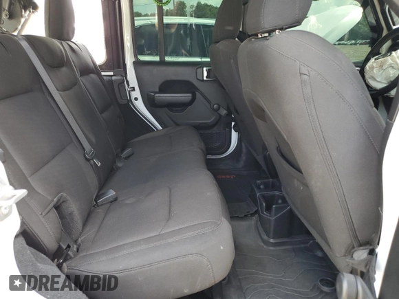 2023 Jeep Wrangler Sport with VIN 1C4HJXDGXPW596127, listed as a Copart auction lot 65395655 with 64,257 mi miles and Salvage title. Bid and sale history available at DreamBid. Image 11.