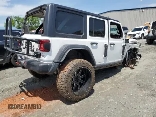 2022 Jeep Wrangler Unlimited Rubicon with VIN 1C4HJXFN2NW211037, listed as a Copart auction lot 49897115 with 21,878 mi miles and Salvage title. Bid and sale history available at DreamBid. Image 3.