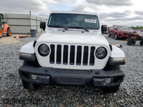 2023 Jeep Wrangler Sport S with VIN 1C4HJXDNXPW569699, listed as a Copart auction lot 52392145 with 32,972 mi miles and Salvage title. Bid and sale history available at DreamBid. Image 5.