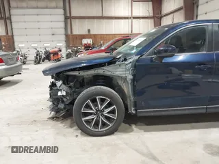2018 Mazda CX-5 Touring with VIN JM3KFBCM5J0434716, listed as a IAAI auction lot 41738956 with 108,264 mi miles and . Bid and sale history available at DreamBid. Image 6.