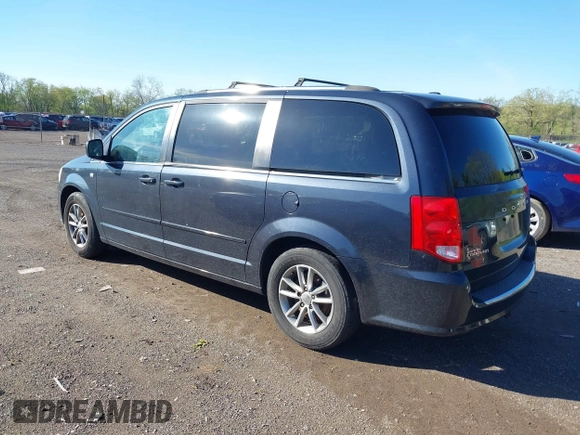 2014 Dodge Grand Caravan SXT with VIN 2C4RDGCG0ER223309, listed as a IAAI auction lot 42161438 with 175,867 mi miles and . Bid and sale history available at DreamBid. Image 3.