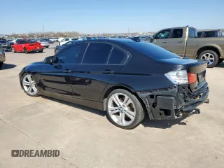2013 BMW 3 Series 335i with VIN WBA3A9G57DNP36052, listed as a Copart auction lot 50204825 with 158,102 mi miles and Salvage title. Bid and sale history available at DreamBid. Image 2.