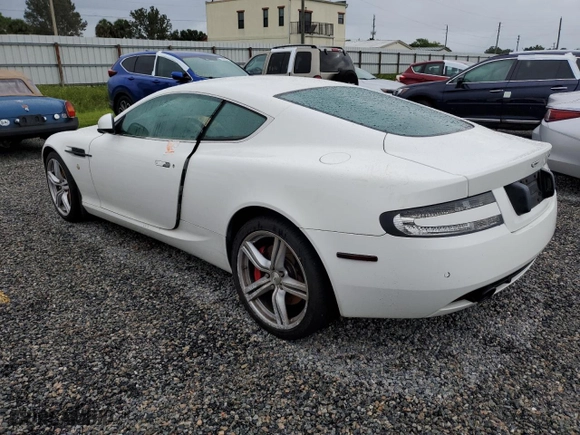 2011 Aston Martin DB9 with VIN SCFFDAAE8BGA13186, listed as a Copart auction lot 74703544 with 0 mi miles and Salvage Title. Bid and sale history available at carsss.com. Image 2.