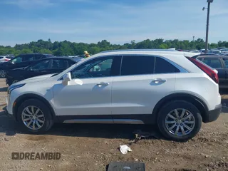 2019 Cadillac XT4 AWD Premium Luxury with VIN 1GYFZDR46KF146443, listed as a IAAI auction lot 42590358 with 62,131 mi miles and . Bid and sale history available at DreamBid. Image 14.
