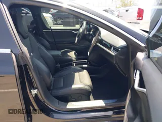 2017 Tesla Model S 60 with VIN 5YJSA1E17HF232699, listed as a IAAI auction lot 42327539 with 113,923 mi miles and . Bid and sale history available at DreamBid. Image 5.