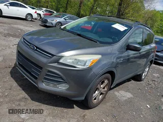2013 Ford Escape SE with VIN 1FMCU0GX6DUB47180, listed as a IAAI auction lot 42029346 with 147,740 mi miles. Bid and sale history available at carsss.com. Image 2.