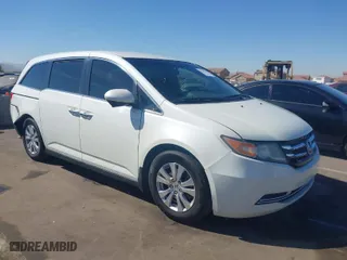 2016 Honda Odyssey SE with VIN 5FNRL5H34GB155026, listed as a IAAI auction lot 41651349 with 141,484 mi miles. Bid and sale history available at carsss.com. Image 1.