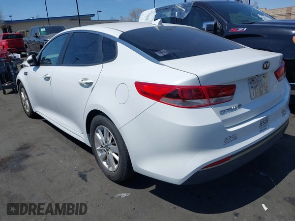 2016 Kia Optima LX with VIN 5XXGT4L37GG121295, listed as a IAAI auction lot 41922348 with 82,238 mi miles. Bid and sale history available at carsss.com. Image 3.