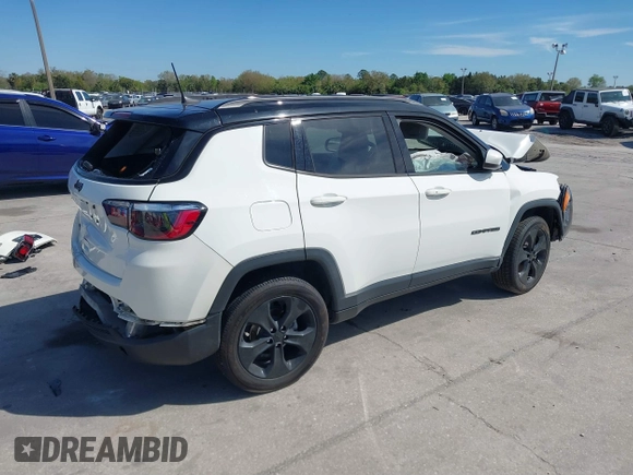2021 Jeep Compass Latitude with VIN 3C4NJDBB7MT566237, listed as a IAAI auction lot 41747738 with 33,395 mi miles and . Bid and sale history available at DreamBid. Image 4.