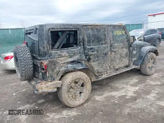 2012 Jeep Wrangler Unlimited Call of Duty MW3 z VIN 1C4BJWFG0CL202238, wystawiony jako IAAI lot #41956648 z przebiegiem 92 572 mil mil oraz . Historia ofert i sprzedaży dostępna na DreamBid. Obrazek 4.