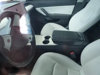 2018 Tesla Model 3 Long Range Battery z VIN 5YJ3E1EB3JF134664, wystawiony jako Copart lot #57288485 z przebiegiem Nie podano mil oraz Szkoda całkowita • Salvage title. Historia ofert i sprzedaży dostępna na DreamBid. Obrazek 7.
