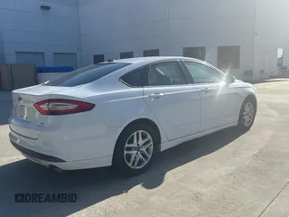 2013 Ford Fusion SE with VIN 3FA6P0HR3DR362036, listed as a Copart auction lot 61274745 with 144,276 mi miles and Clean title. Bid and sale history available at DreamBid. Image 4.