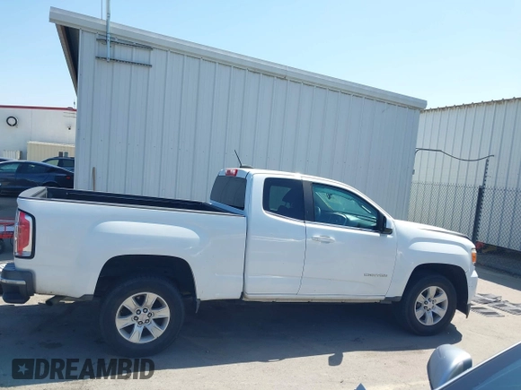 2015 GMC Canyon 2WD SLE z VIN 1GTH5BEA4F1239815, wystawiony jako IAAI lot #42135355 z przebiegiem 110 696 mil mil oraz . Historia ofert i sprzedaży dostępna na DreamBid. Obrazek 14.