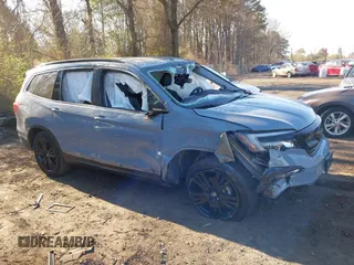 2022 Honda Pilot Special Edition z VIN 5FNYF6H21NB089239, wystawiony jako IAAI lot #42047179 z przebiegiem 22 877 mil mil oraz . Historia ofert i sprzedaży dostępna na DreamBid. Obrazek 12.