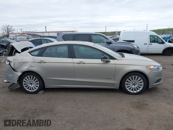 2015 Ford Fusion SE Hybrid with VIN 3FA6P0LU6FR210606, listed as a IAAI auction lot 42070466 with 123,043 mi miles and . Bid and sale history available at DreamBid. Image 14.