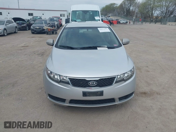 2012 Kia Forte EX with VIN KNAFU4A25C5591601, listed as a IAAI auction lot 42071351 with 120,636 mi miles. Bid and sale history available at carsss.com. Image 6.