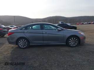 2014 Hyundai Sonata SE with VIN 5NPEC4AC6EH823796, listed as a IAAI auction lot 41783754 with 165,841 mi miles and . Bid and sale history available at DreamBid. Image 13.