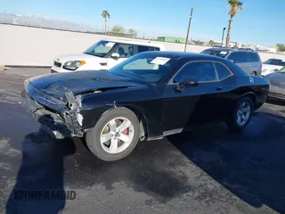 2012 Dodge Challenger SXT Plus z VIN 2C3CDYAG6CH125164, wystawiony jako IAAI lot #41754809 z przebiegiem 95 882 mil mil oraz . Historia ofert i sprzedaży dostępna na DreamBid. Obrazek 15.