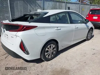 2022 Toyota Prius LE z VIN JTDKAMFP3N3202936, wystawiony jako IAAI lot #42238577 z przebiegiem 38 065 mil mil oraz . Historia ofert i sprzedaży dostępna na DreamBid. Obrazek 4.