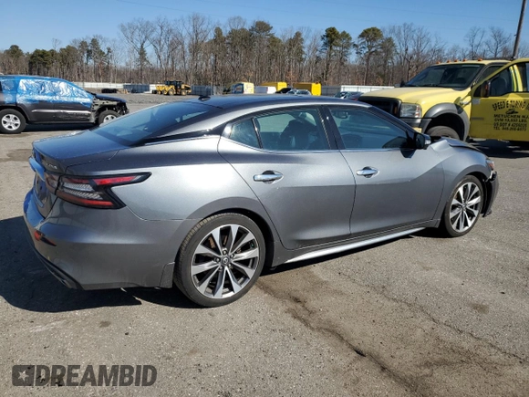 2019 Nissan Maxima Platinum z VIN 1N4AA6AV0KC367101, wystawiony jako Copart lot #46715415 z przebiegiem 68 567 mil mil oraz Szkody całkowita. Historia ofert i sprzedaży dostępna na DreamBid. Obrazek 3.