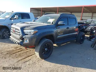 2017 Toyota Tacoma SR5 with VIN 3TMCZ5AN5HM057779, listed as a IAAI auction lot 41008992 with 98,804 mi miles. Bid and sale history available at carsss.com. Image 17.