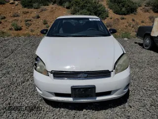 2006 Chevrolet Monte Carlo LT 3.5L z VIN 2G1WM15KX69207940, wystawiony jako Copart lot #58819895 z przebiegiem 212 648 mil mil oraz Szkoda całkowita • Salvage title. Historia ofert i sprzedaży dostępna na DreamBid. Obrazek 5.