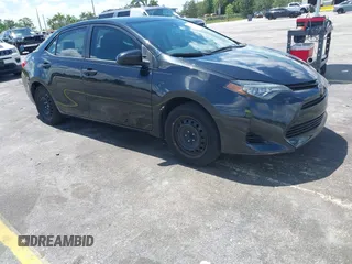 2018 Toyota Corolla L with VIN 5YFBURHE0JP823312, listed as a IAAI auction lot 42518407 with 162,075 mi miles and . Bid and sale history available at DreamBid. Image 1.