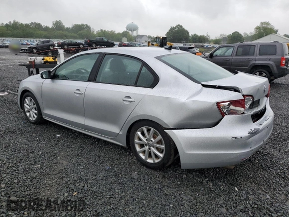2011 Volkswagen Jetta SE with VIN 3VWDZ7AJ5BM319091, listed as a Copart auction lot 57991585 with 185,458 mi miles and Salvage title. Bid and sale history available at DreamBid. Image 2.