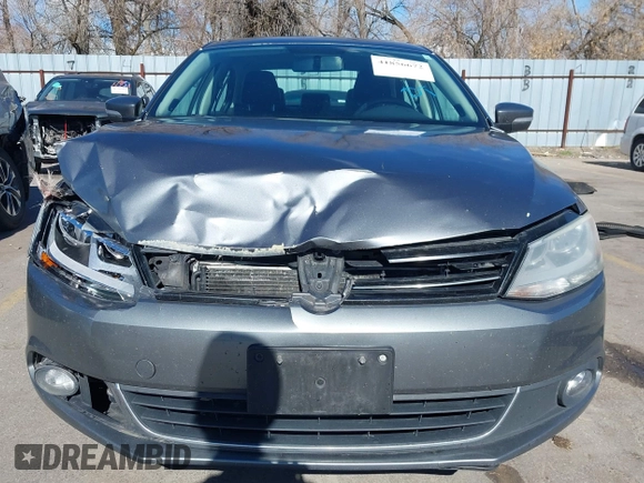 2012 Volkswagen Jetta TDI w/Premium & Nav z VIN 3VWLL7AJ5CM361646, wystawiony jako IAAI lot #41856672 z przebiegiem 190 292 mil mil oraz . Historia ofert i sprzedaży dostępna na DreamBid. Obrazek 12.