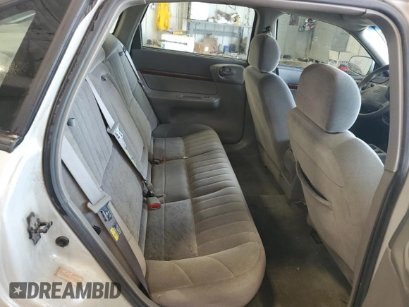 2003 Chevrolet Impala z VIN 2G1WF52EX39441944, wystawiony jako Copart lot #59876805 z przebiegiem 212 313 mil mil oraz Nie do naprawy • Non repairable. Historia ofert i sprzedaży dostępna na DreamBid. Obrazek 10.