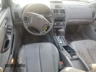 2001 Nissan Maxima GXE z VIN JN1CA31D11T828767, wystawiony jako Copart lot #69504024 z przebiegiem 177 431 mil mil oraz Szkoda całkowita • Salvage title. Historia ofert i sprzedaży dostępna na DreamBid. Obrazek 8.