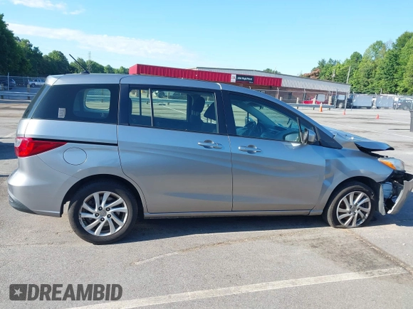 2012 Mazda 5 Sport with VIN JM1CW2BLXC0129303, listed as a IAAI auction lot 42556899 with 200,863 mi miles and . Bid and sale history available at DreamBid. Image 14.
