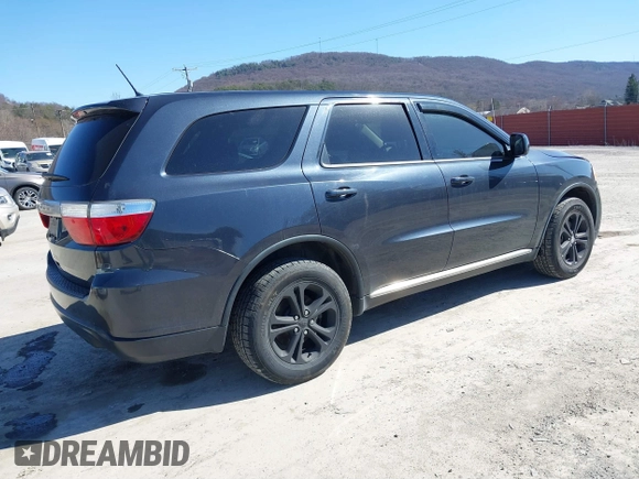 2013 Dodge Durango SXT with VIN 1C4RDJAG2DC530407, listed as a IAAI auction lot 41837441 with 133,375 mi miles and . Bid and sale history available at DreamBid. Image 4.