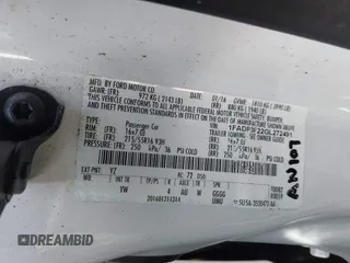 2016 Ford Focus SE with VIN 1FADP3F22GL272491, listed as a IAAI auction lot 42042160 with 140,355 mi miles. Bid and sale history available at carsss.com. Image 9.