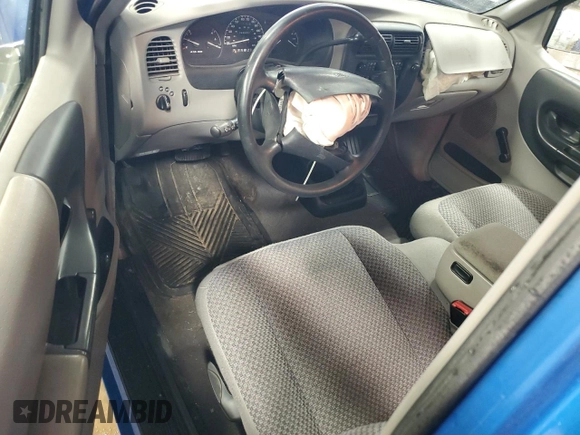 1999 Ford Ranger XLT with VIN 1FTYR10X0XUA52307, listed as a Copart auction lot 50044505 with 94,457 mi miles and Salvage title. Bid and sale history available at DreamBid. Image 8.