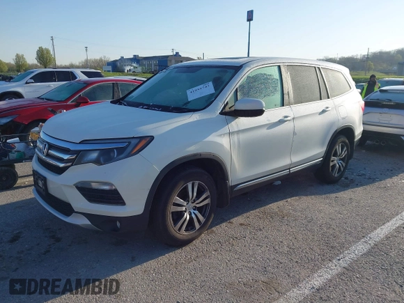 2017 Honda Pilot EX-L with VIN 5FNYF6H54HB015814, listed as a IAAI auction lot 41955743 with 122,389 mi miles and . Bid and sale history available at DreamBid. Image 17.