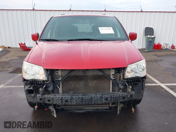 2014 Dodge Grand Caravan SXT with VIN 2C4RDGCG3ER257695, listed as a IAAI auction lot 41534568 with 116,896 mi miles and . Bid and sale history available at DreamBid. Image 13.