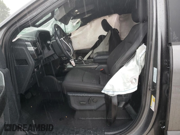 2023 Ford F-150 XL with VIN 1FTFW1E86PFA65505, listed as a Copart auction lot 60644385 with 6,959 mi miles and Salvage title. Bid and sale history available at DreamBid. Image 7.