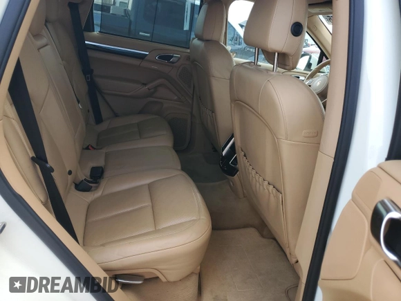 2012 Porsche Cayenne with VIN WP1AA2A23CLA02615, listed as a Copart auction lot 64604655 with 131,536 mi miles and Salvage title. Bid and sale history available at DreamBid. Image 11.