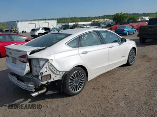2017 Ford Fusion Hybrid Titanium с VIN 3FA6P0RU7HR148191, выставлен на аукционе IAAI как лот 42167708 с пробегом 72 708 миль миль и . История ставок и продаж доступна на DreamBid. Изображение 4.