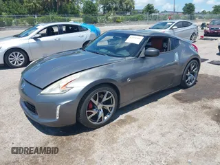 2013 Nissan 370Z Touring z VIN JN1AZ4EH2DM384011, wystawiony jako IAAI lot #42274166 z przebiegiem 87 499 mil mil oraz . Historia ofert i sprzedaży dostępna na DreamBid. Obrazek 17.