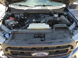 2023 Ford F-150 XL with VIN 1FTEW1CB6PKD83299, listed as a Copart auction lot 67133984 with 14,693 mi miles and Salvage Title. Bid and sale history available at carsss.com. Image 11.
