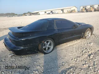 2000 Pontiac Firebird Formula z VIN 2G2FV22G4Y2175318, wystawiony jako Copart lot #68737224 z przebiegiem 229 394 mil mil oraz Szkoda całkowita • Salvage title. Historia ofert i sprzedaży dostępna na DreamBid. Obrazek 3.