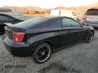 2004 Toyota Celica GT with VIN JTDDR32T040168744, listed as a Copart auction lot 85504754 with 210,919 mi miles and Clean Title. Bid and sale history available at DreamBid. Image 3.
